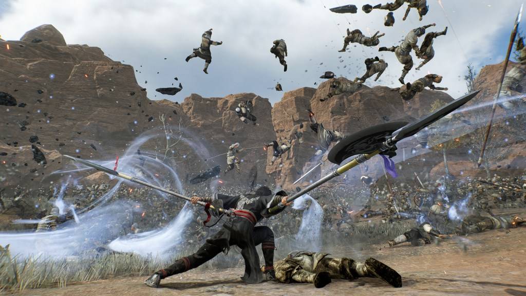 The Wanderer skillfully wields twin pikes against a large enemy force in Dynasty Warriors: Origins